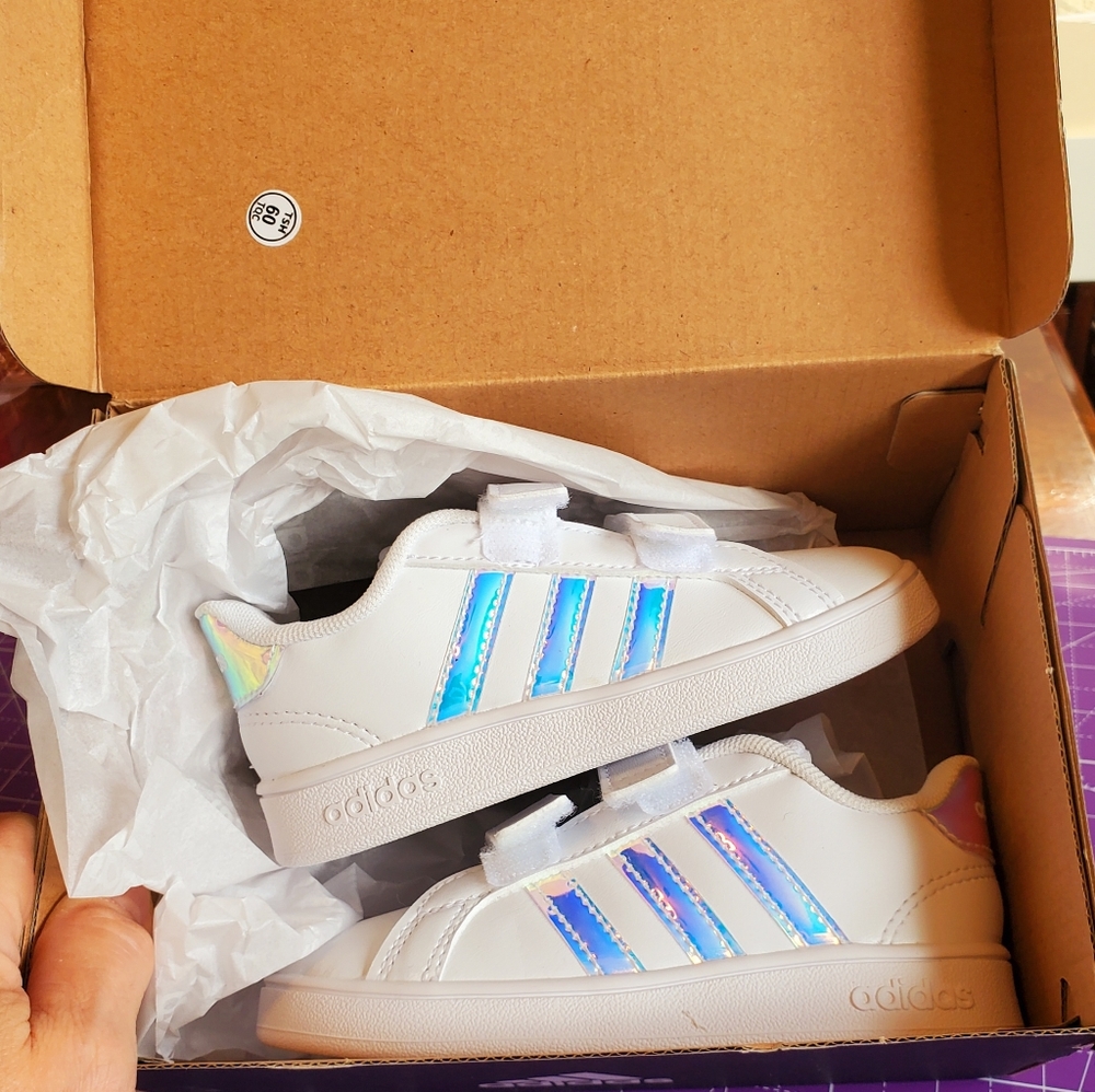 NIB Toddler Girls Adidas tennis shoes. SIZE 8. White with iridescent stripes.